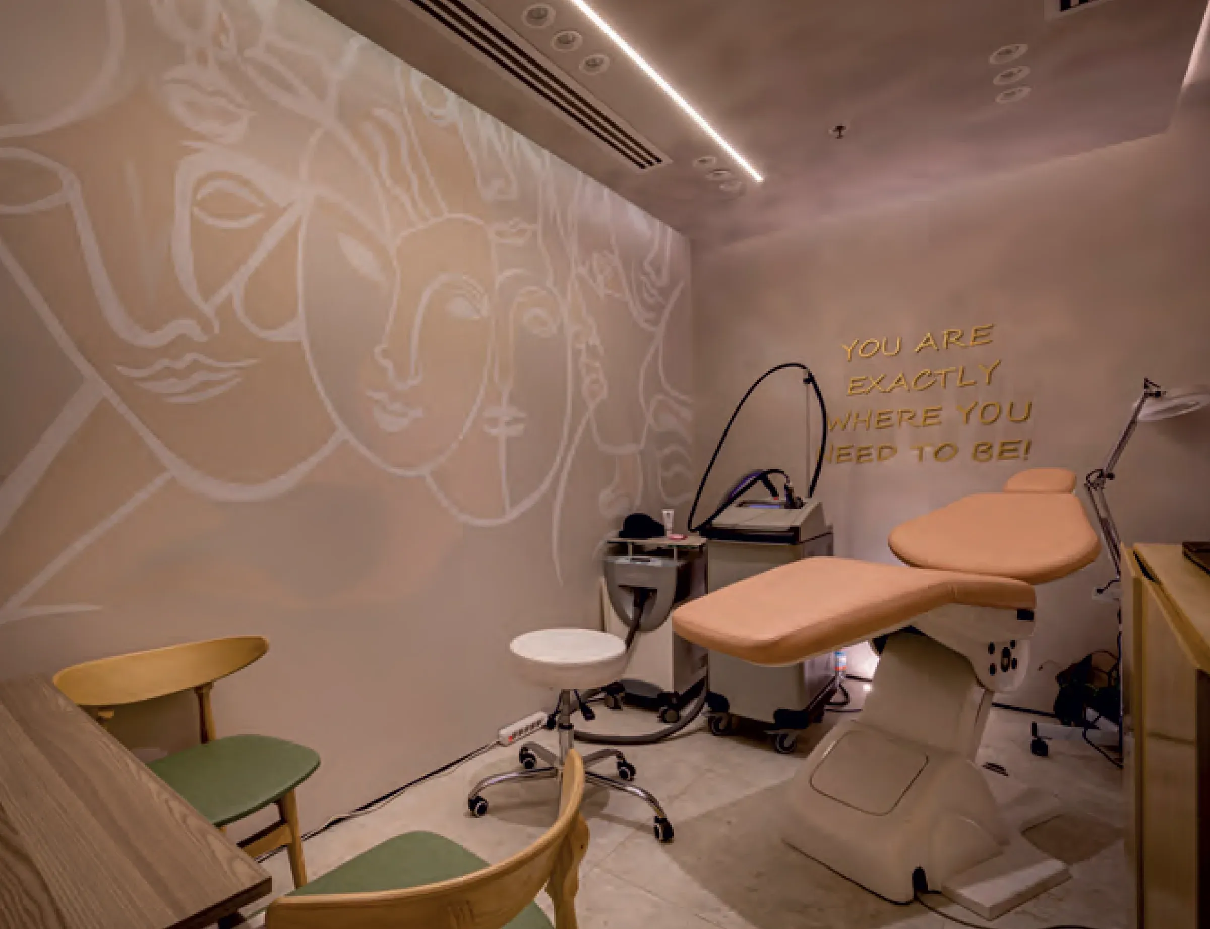 Curved seating and warm plaster finishes inside a private clinic interior
